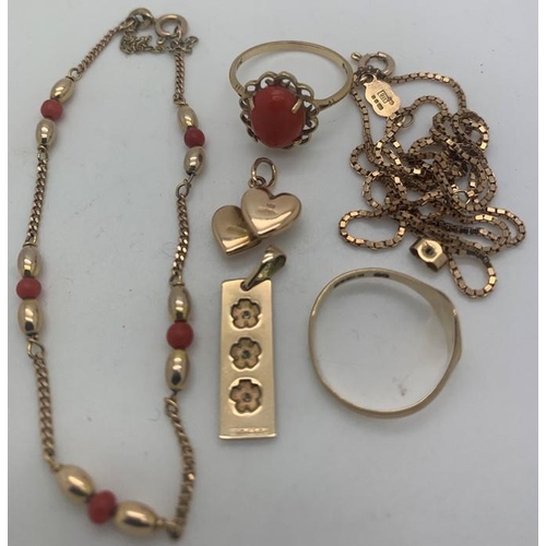 728 - Nine carat gold including two charms, coral and gold bracelet, coral and gold ring, earring back and... 