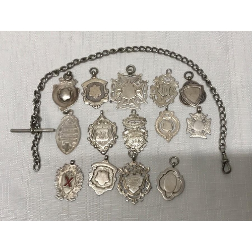 738 - Collection of fourteen silver fob pendants and one silver pocket watch chain A.S Birmingham 1916, 35... 