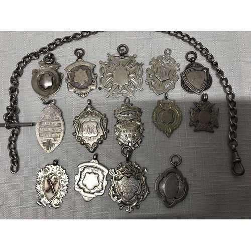 738 - Collection of fourteen silver fob pendants and one silver pocket watch chain A.S Birmingham 1916, 35... 