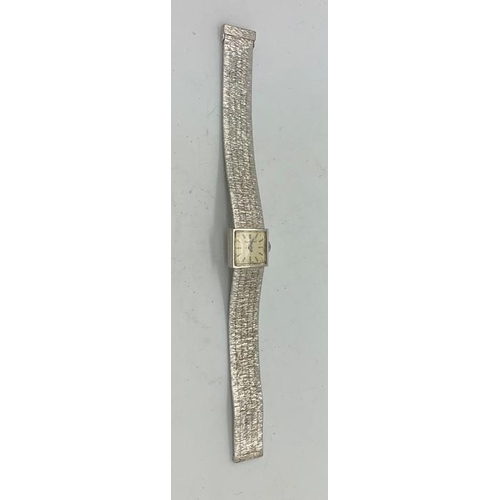 740 - An 18ct white gold ladies bracelet, Beuche Girod. 48gms total to weight.