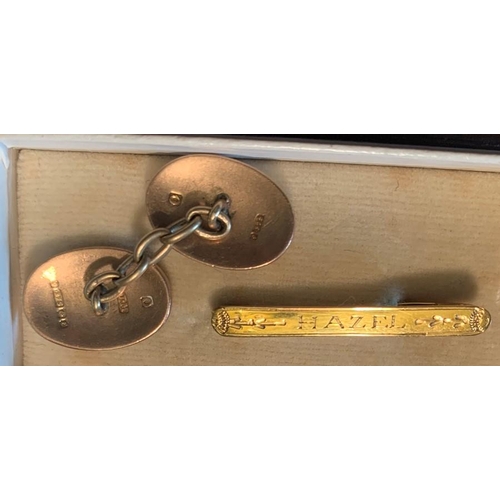 744 - A 9ct gold bar brooch inscribed HAZEL and a single 9ct cufflinks. Total weight 6gms.