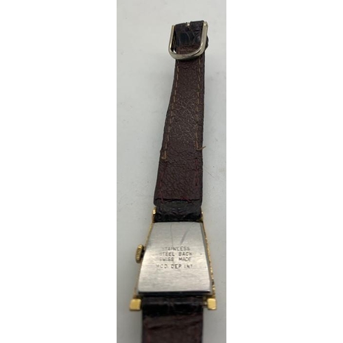 750 - A lady's triangular wristwatch Orfina 17 jewel Incabloc with leather strap, swiss made.