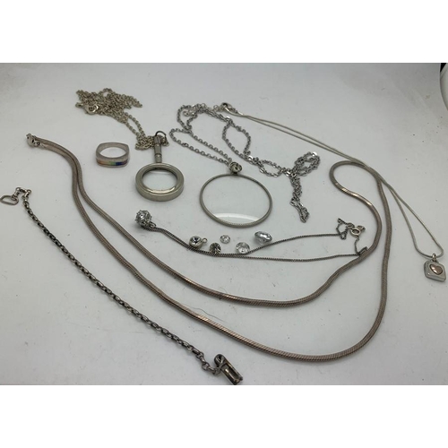 751 - A quantity of white metal jewellery mostly marked .925 including chains, ring, two magnifying glasse... 