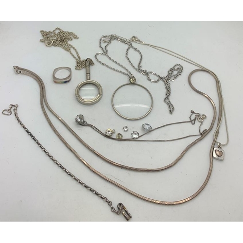 751 - A quantity of white metal jewellery mostly marked .925 including chains, ring, two magnifying glasse... 