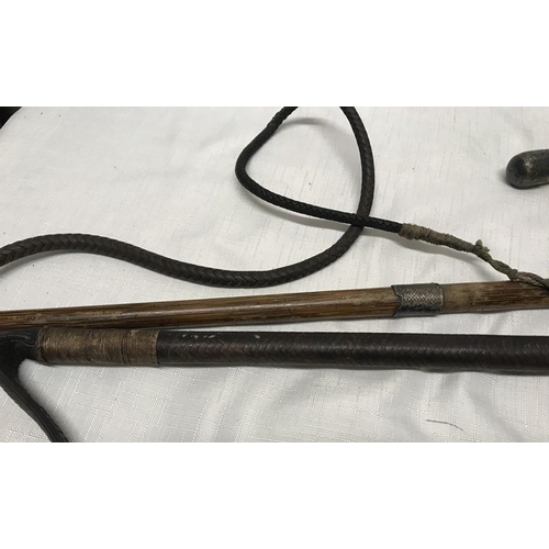 782 - Carved horn handled riding crop with silver collar and rope twist leather shaft. Initialled S.W.H. m... 