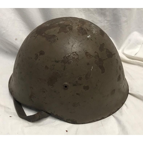 786 - A WW II Italian Military helmet.