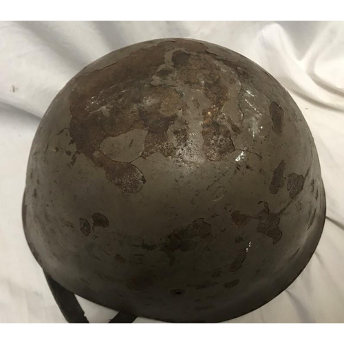 786 - A WW II Italian Military helmet.