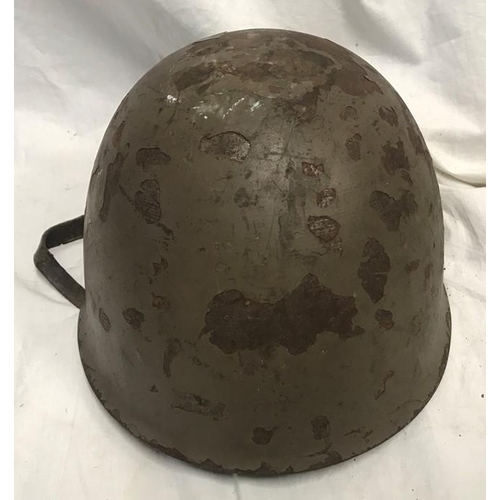 786 - A WW II Italian Military helmet.