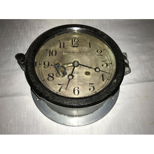 788 - A Chelsea ships bell bulk head clock with silvered Arabic dial, fast/slow regulation below 12 o'cloc... 