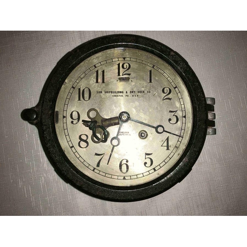 788 - A Chelsea ships bell bulk head clock with silvered Arabic dial, fast/slow regulation below 12 o'cloc... 