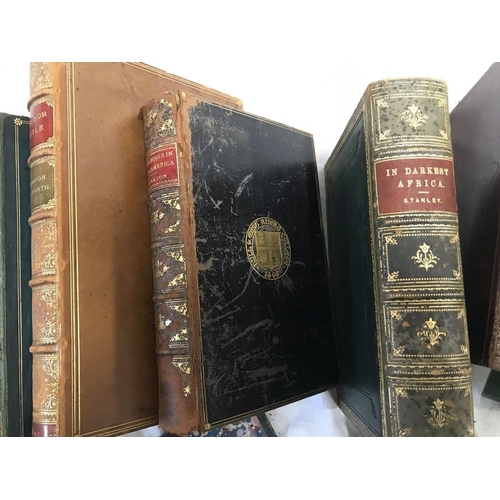 799 - Selection of 9 leather bound and gilded college books in Darkest Africa, Hymers College 1897, Star-L... 