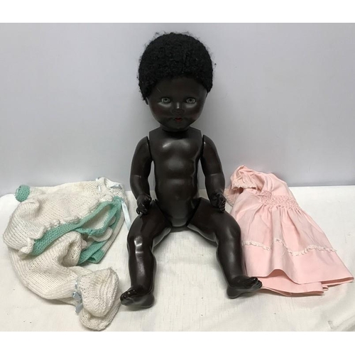 837 - Large composition black doll, blue eyes and crying sound box, makers mark FP 23, approx 58cms h, som... 