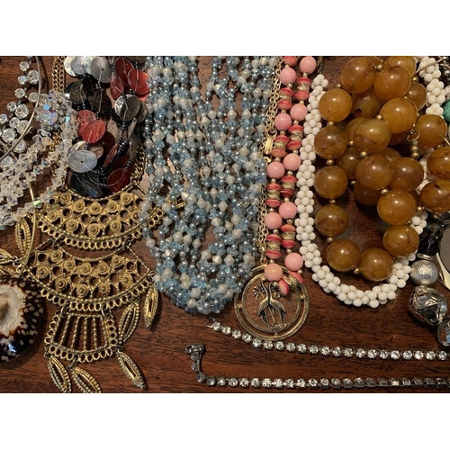 84 - A huge collection of costume jewellery to include watches, necklaces, bracelets, Pierre Cardin earri... 