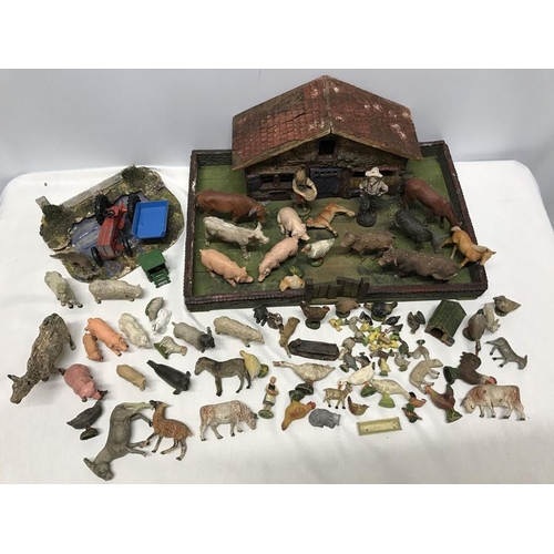 853 - Pre war composition Elastolin figures with Farm Buiding and garden pond. 43 w x 29cms, some marked E... 