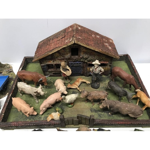 853 - Pre war composition Elastolin figures with Farm Buiding and garden pond. 43 w x 29cms, some marked E... 