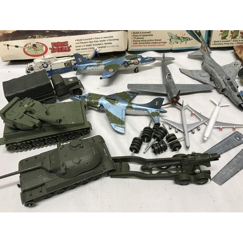 854 - Selection of playworn diecast military vehicles and aircraft together with three Dinky kits 1037 Chi... 