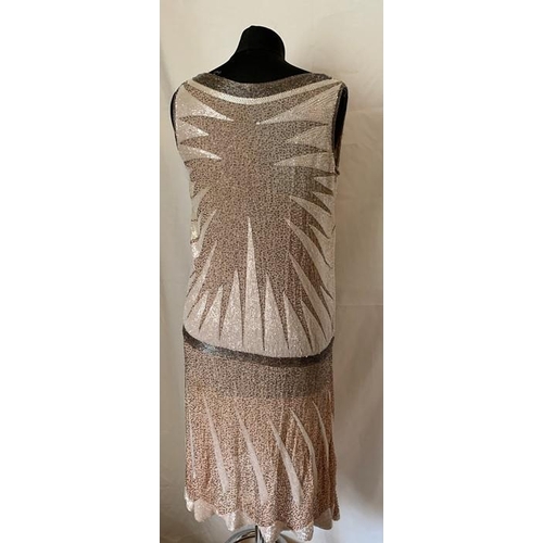 91 - A vintage French beaded evening dress, labelled Made in France, 44. 99cms l, under arm to arm laid f... 