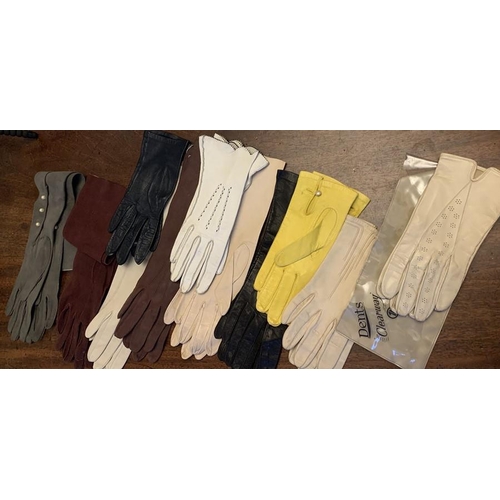 95 - Eleven pairs of vintage kid leather suede gloves to include long evening gloves.