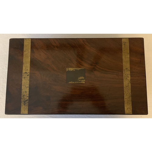 1271 - A Victorian mahogany brass bound lap desk with tooled leather writing slope. Two original inkwells a... 