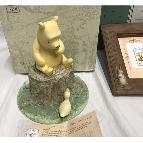 250C - Border Fine Arts Winnie the Pooh classics. Photo frame 26 w x 21cms h and a mini canister Pooh sat o... 