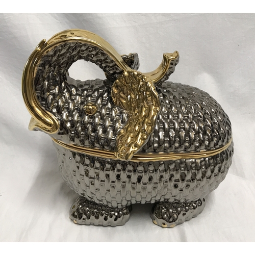 255H - Italian pottery, large gilt and silver decorated lidded dish in the form of an elephant 24cms h appr... 