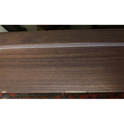 1286 - A mid Century Trich rosewood long John coffee table. Made in Denmark, 150 x 54cms,