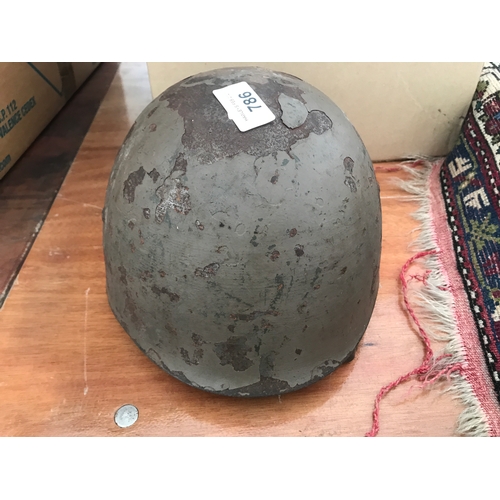 786 - A WW II Italian Military helmet.