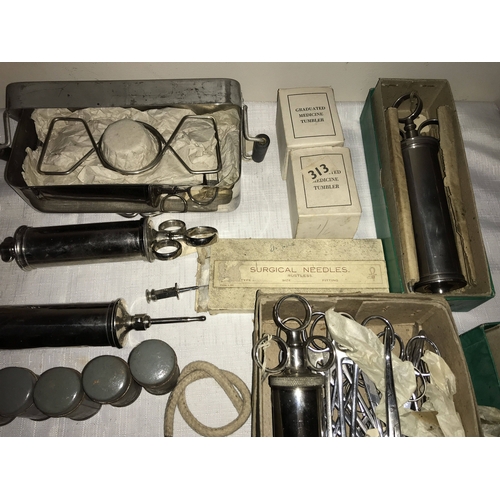 1212 - Vintage surgical equipment including WW II, cased ophthalmoscope Brady & Martin, surgical needles, a... 