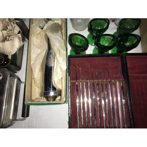 1212 - Vintage surgical equipment including WW II, cased ophthalmoscope Brady & Martin, surgical needles, a... 