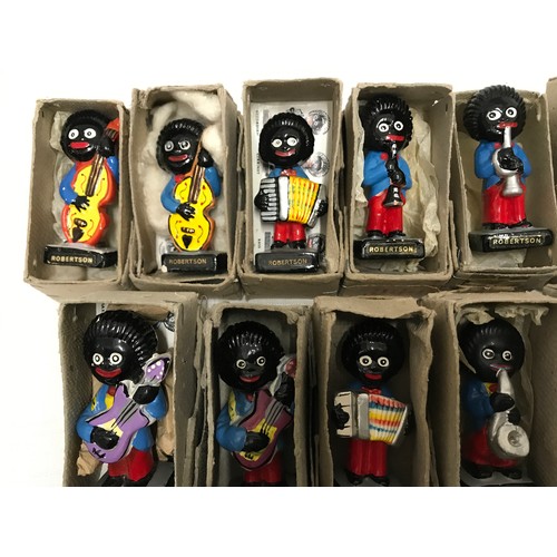 1 - Collection of 14 Robertson's pottery musicians, 13 with packaging boxes.
