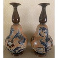 Pair of Doulton Lambeth vases. 27.5cms h.