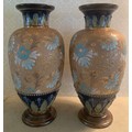 Pair of Douton Slaters and lace work decorated jars.  30cms h.