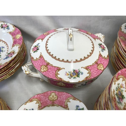 11 - Royal Albert Lady Carlyle tea and dinner ware. Pink ground floral design with gilt border. 129 piece... 