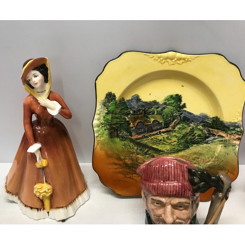 14 - Selection of Royal Doulton.Two figurines, Julia HN2705 20cm h. Top 'O' the hill HN1834 19cm h.
Toby ... 