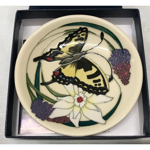 25 - Moorcroft Butterfly and Narcissus flower design pin tray 12cm d, circa 2009 with box.