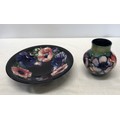 Two Moorcroft pottery Anemone design vase and bowl. Vase 13cm with signature mark to base along with... 