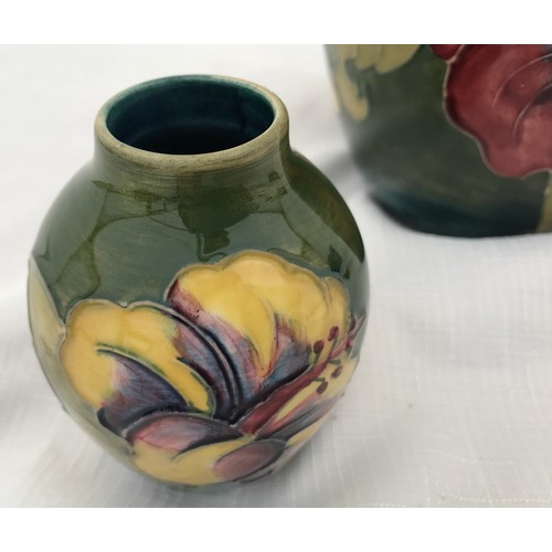 37 - A Moorcroft ginger jar 16cm h , green ground and a small Moorcroft vase 9cm h.