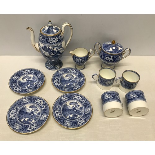 54 - A Wedgwood blue and white part tea set. Country Cottage pattern. To include a teapot 18cm h, cream j... 