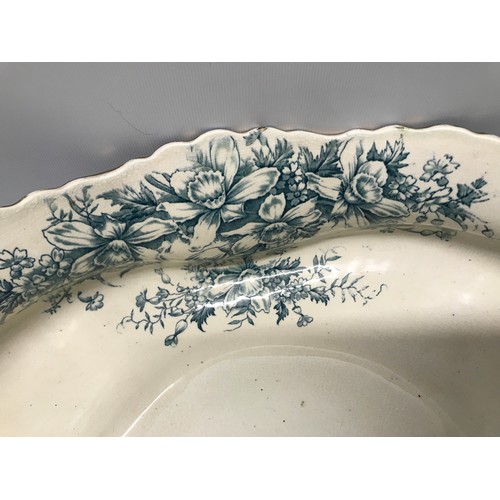 57 - A jug and washbowl set in a blue and white floral pattern. Ten pieces. T.R and Co Derby.