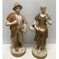 A pair of Royal Dux figurines in Harvest Time. Male with wheat and female with apples. Approx. 54cm ... 
