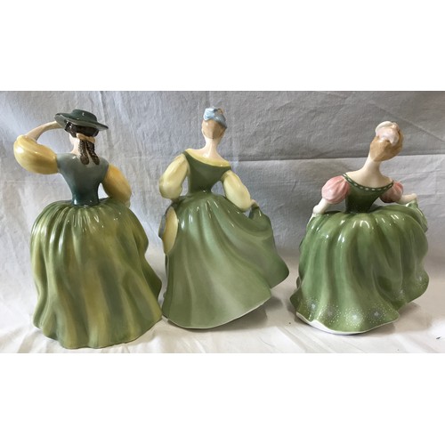 70 - Three Royal Doulton figurines, Fair Lady HN2193 20cmh, Buttercup HN2309 19cm and Michele HN2234 17cm... 