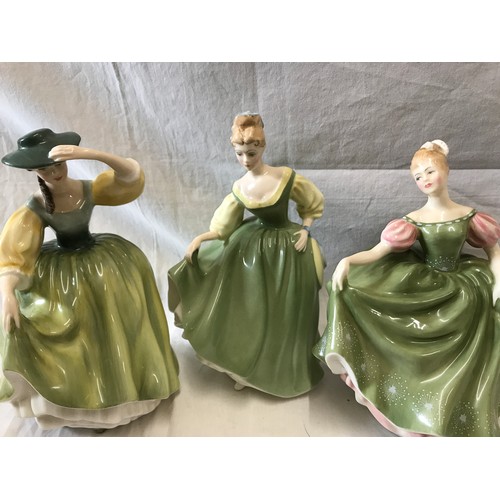 70 - Three Royal Doulton figurines, Fair Lady HN2193 20cmh, Buttercup HN2309 19cm and Michele HN2234 17cm... 