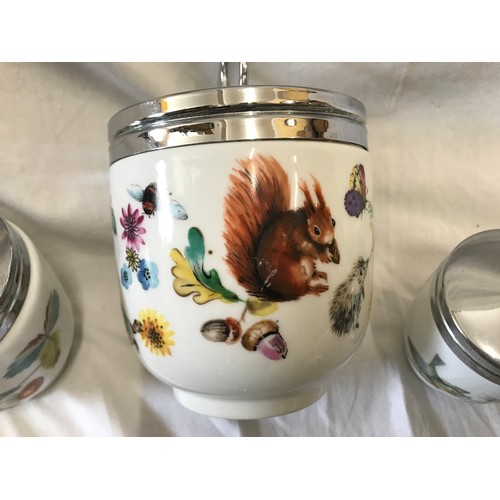 87 - Thirty one Royal Worcester egg coddlers. 12 x 8.5cms h, floral one large animals pattern 10cms, 3 an... 