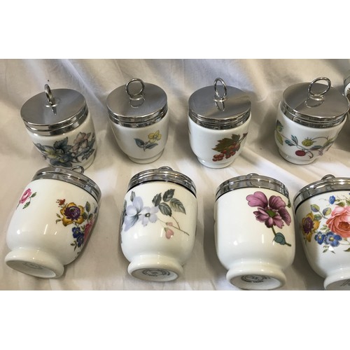 87 - Thirty one Royal Worcester egg coddlers. 12 x 8.5cms h, floral one large animals pattern 10cms, 3 an... 