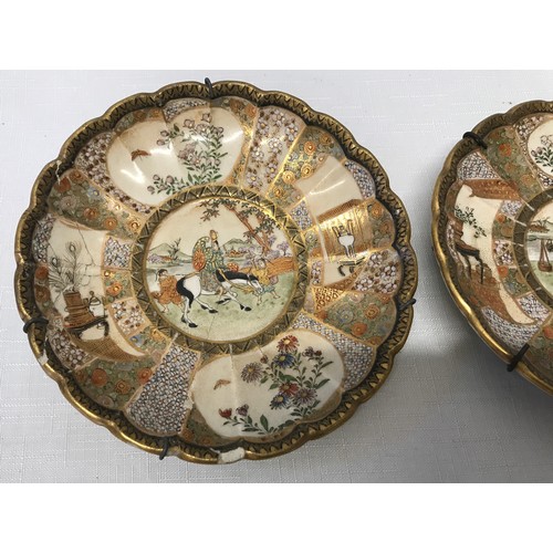 89 - A pair of Japanese Satsuma Meiji side plate saucers 16cms d and signed to the base.