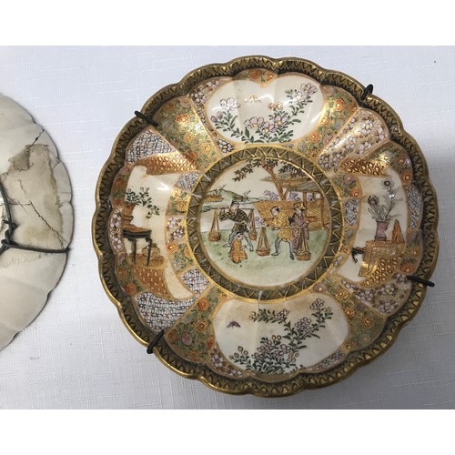 89 - A pair of Japanese Satsuma Meiji side plate saucers 16cms d and signed to the base.