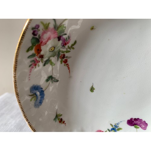 103 - Three early 19thC porcelain floral decorated cups and saucers possibly Swansea.