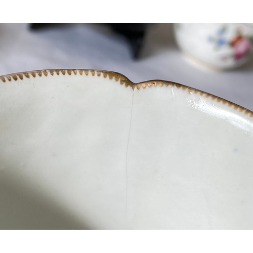 103 - Three early 19thC porcelain floral decorated cups and saucers possibly Swansea.