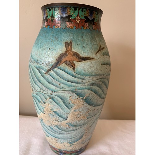 109 - A Cloisonne vase depicting bird in flight. 31cms h.