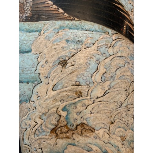 109 - A Cloisonne vase depicting bird in flight. 31cms h.